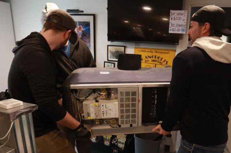 Christie, the Kanopolis Drive-In’s old projector, is removed from the projection room Monday afternoon. The projector was deemed unrepairable in October, and a new projector will be installed this week. KAREN BONAR/Ellsworth County Independent-Reporter