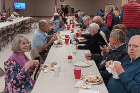 Attendees enjoy lunch at the Ellsworth American Legion on Memorial Day. JASON R. HICKS/Ellsworth County Independent-Reporter