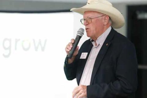 Ron Wilson reads his poem about Ellsworth during the Grow Ellsworth County banquet March 23. KAREN BONAR/Ellsworth County Independent-Reporter