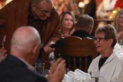 David Brownback visits with founding board chair Sara Soukup at the celebration Nov. 1 at The Barn in Wilson.