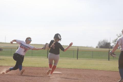 KAREN BONAR/Ellsworth County Independent-Reporter Ellsworth’s Cora Kyler (#6) attempts to steal second base during the April 7 home softball game against Russell. 