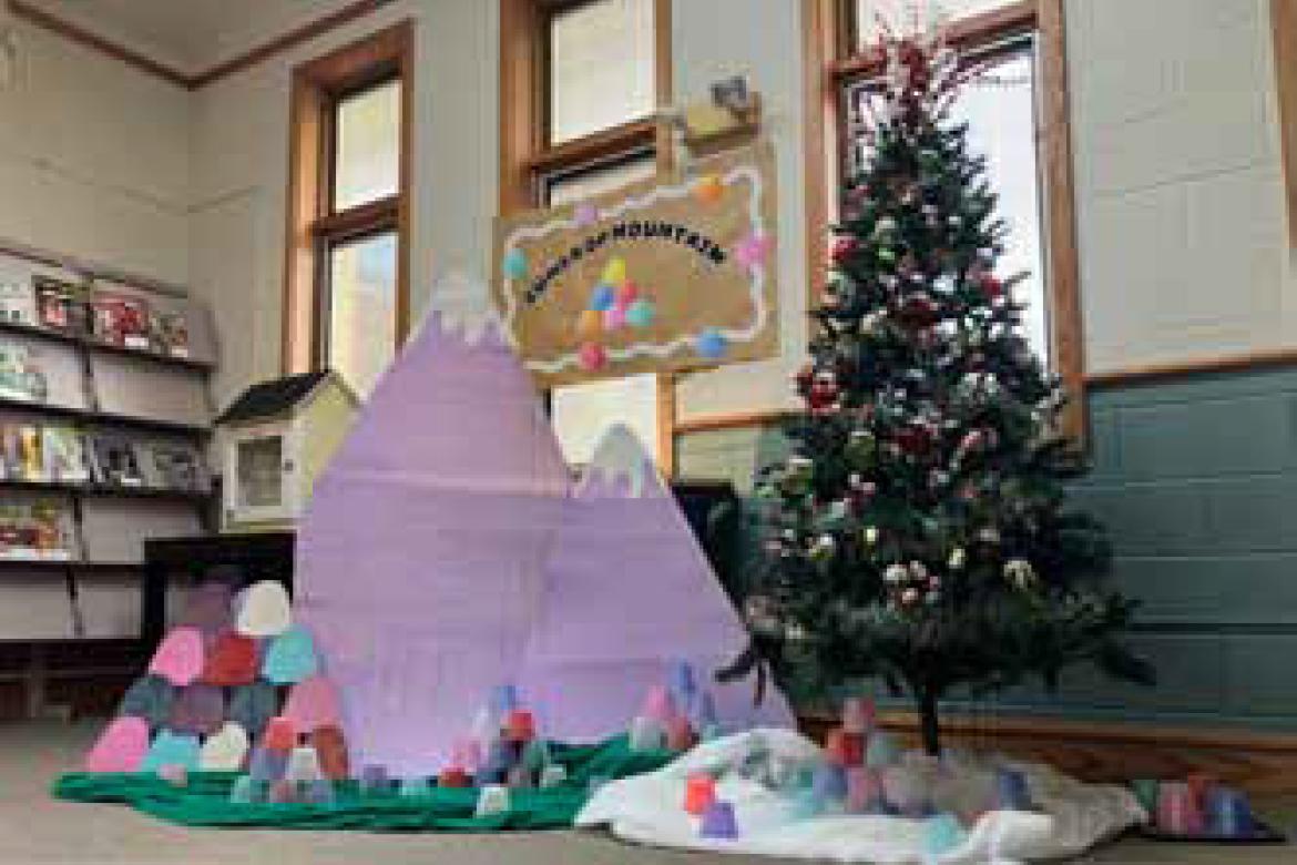 The magazine/entry area is decorated with a Gumdrop Mountain theme.