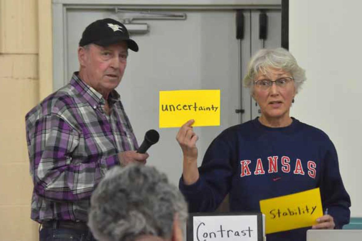 Mike Kratky and Roberta Meier discuss the possibilities of a request for an administrative review hearing during a meeting on March 17. CATHERINE DOUD/Ellsworth County Independent-Reporter